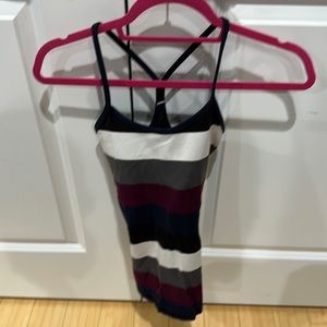 Lululemon fitted workout top. Worn once. Built in pads. Size 4.